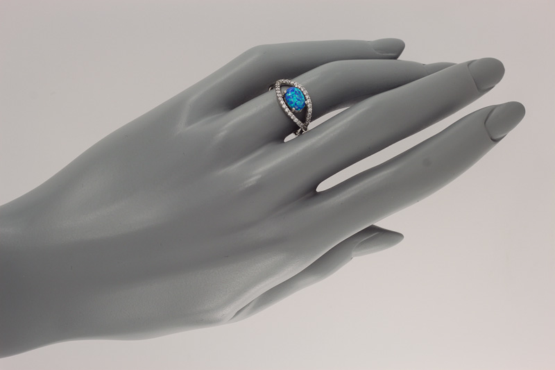 Изображение Серебряное кольцо с опалом и цирконами 17 мм