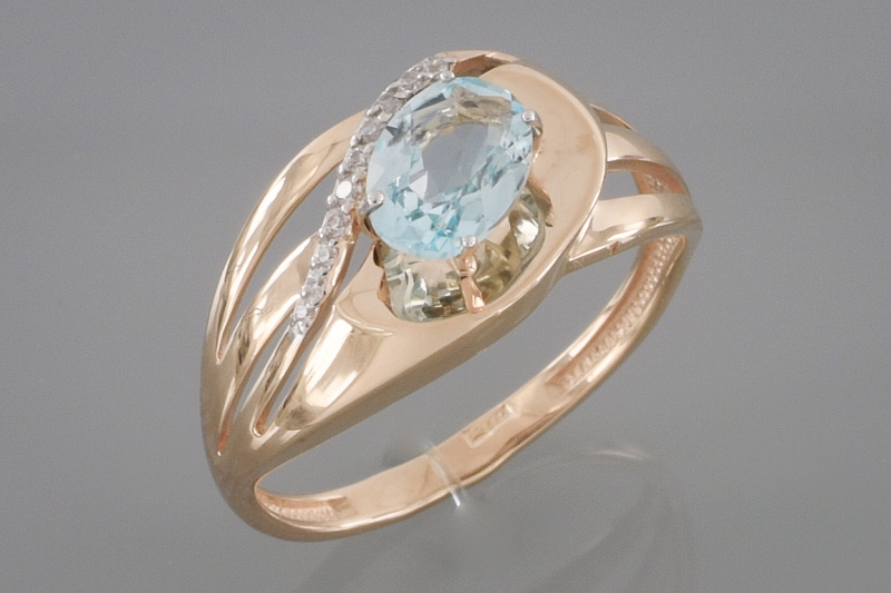 Изображение Золотое кольцо с топазом и цирконами