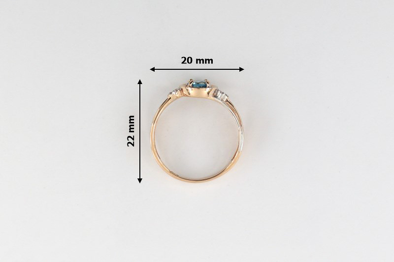 Изображение Золотое кольцо с топазом и цирконами