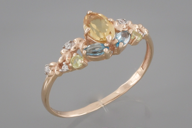 Изображение Золотое кольцо с цирконами и хризолитами 18 мм
