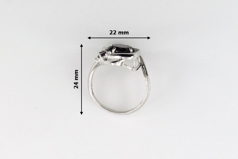 Изображение Серебряное кольцо с гранатами и раухтопазом