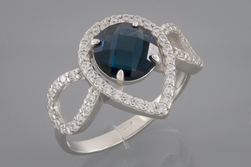 Изображение Серебряное кольцо с цирконами и синт. топазом